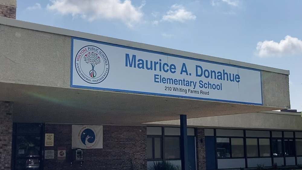 Maurice A. Donahue Elementary School banner at roofline of school building