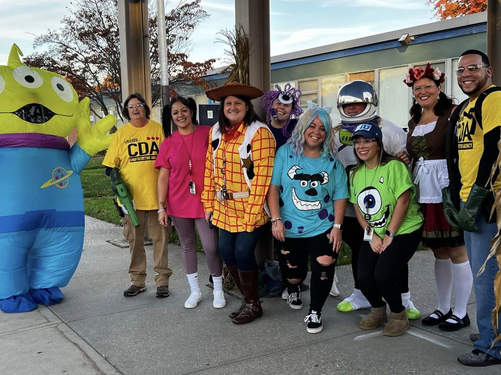 Educators in their halloween costumes.