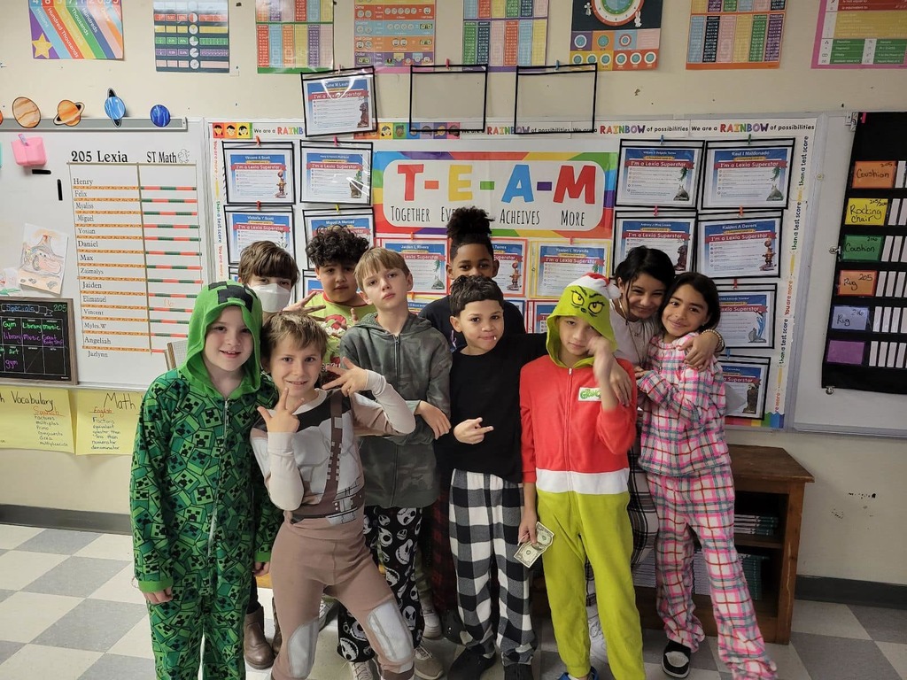 Group of students wearing pijamas. 