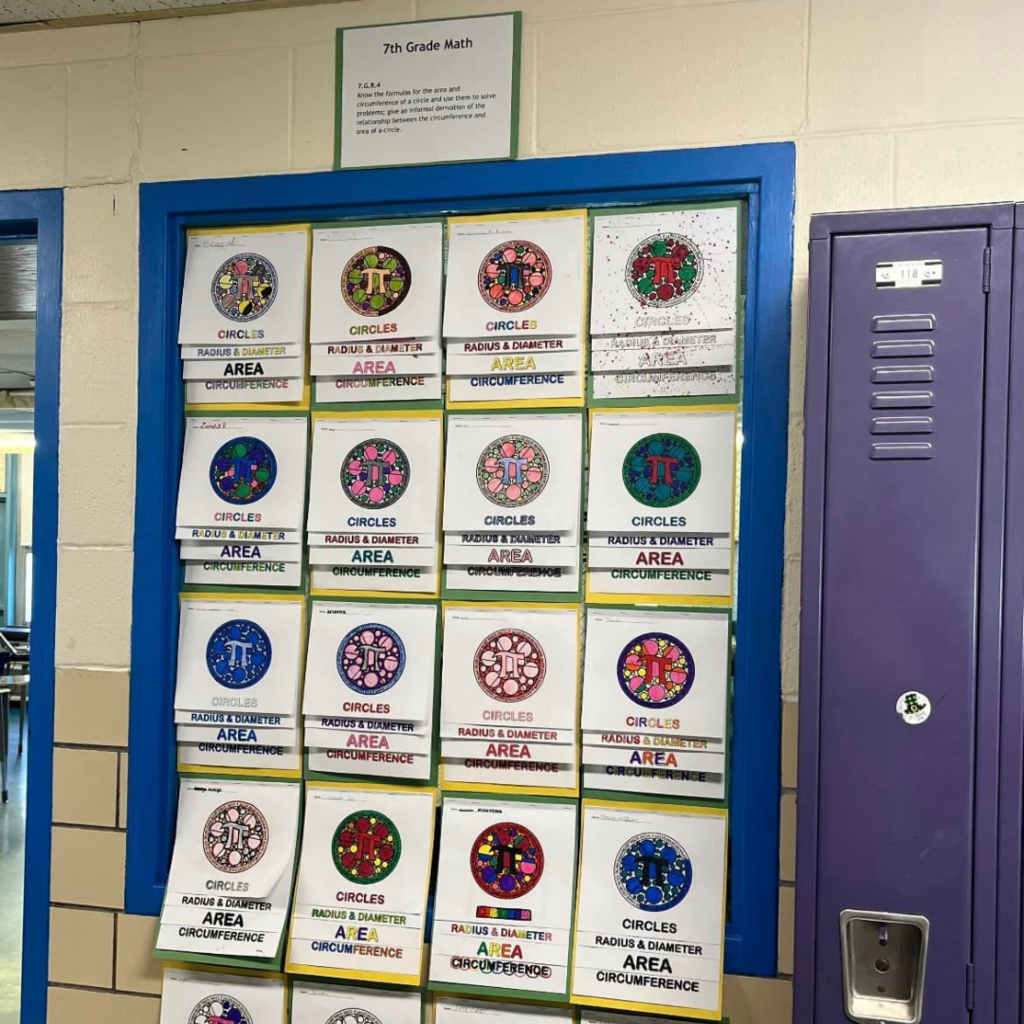 A classroom door decorated in  colorful drawings of mathematical pi symbol.